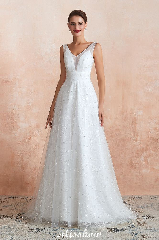 Elegante vestido de novia de tul con escote en V y perlas para playa