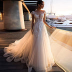 MYYBLE Boho Beach Wedding Dress O-Neck Appliques Lace Top Vintage Princess Wedding Gown Cap Sleeve Simple Bride Dress 2020-payinti