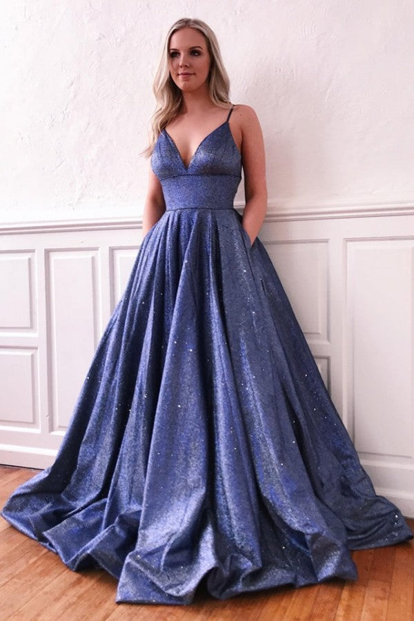 Fascinante vestido de fiesta largo de seda brillante con escote en V y corte A con bolsillos