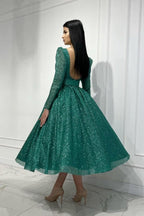 Glamoroso vestido de fiesta verde oscuro de corte A con lentejuelas, largo hasta los tobillos y mangas largas