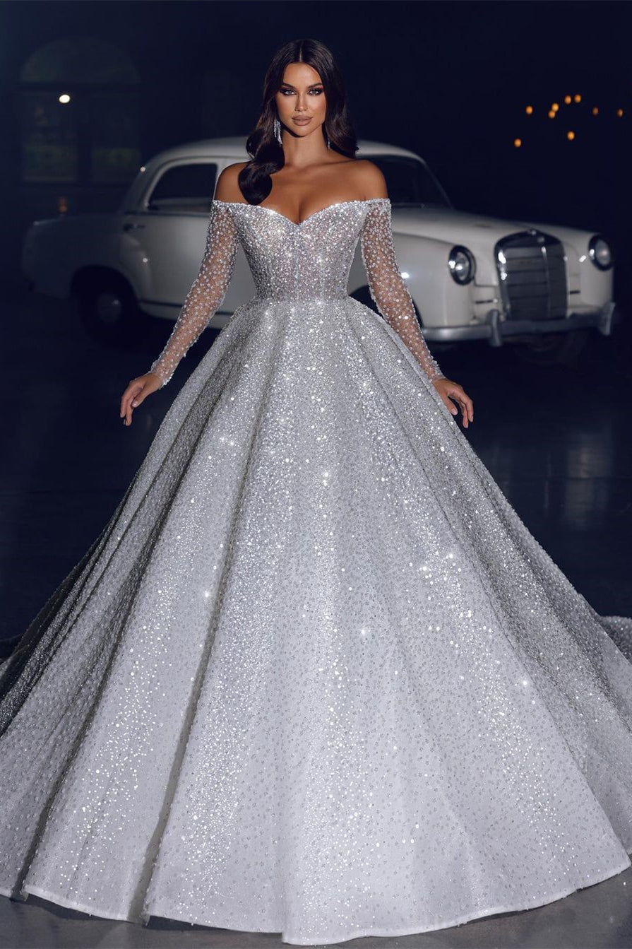 Glamouröses schulterfreies A-Linien-Brautkleid mit langen Ärmeln und Schleppe
