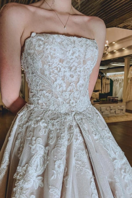 Hermosos vestidos de novia sin mangas con apliques de encaje en forma de A