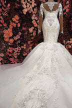 Wunderschönes Meerjungfrau-Brautkleid mit Kristallen und langen Ärmeln und Kapellenschleppe