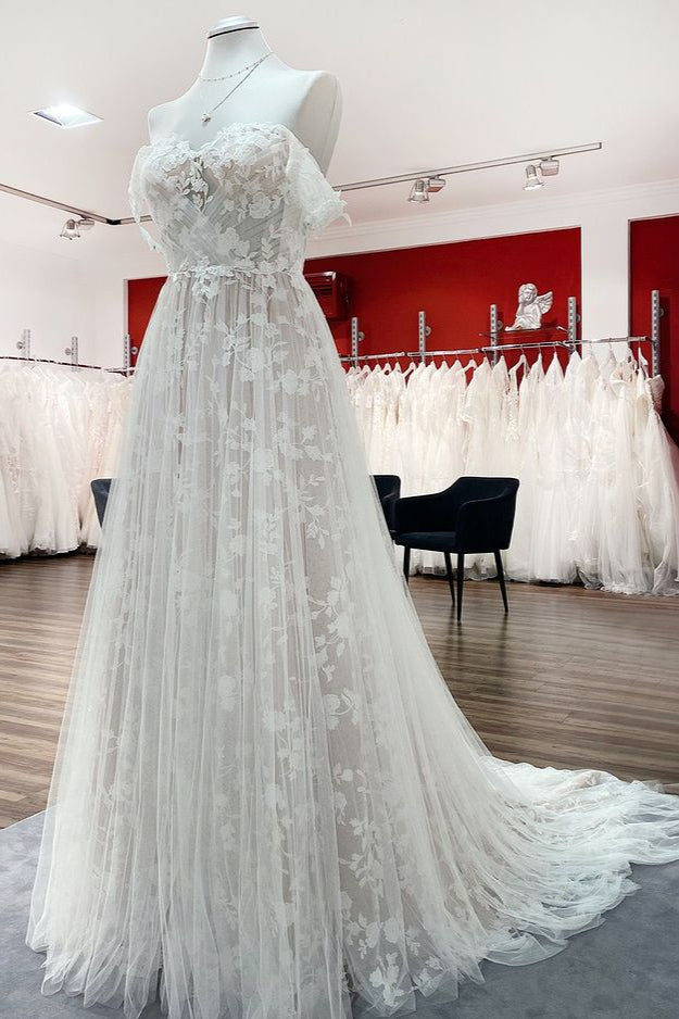 Hermoso vestido de novia largo de corte A con hombros descubiertos, apliques de tul y encaje