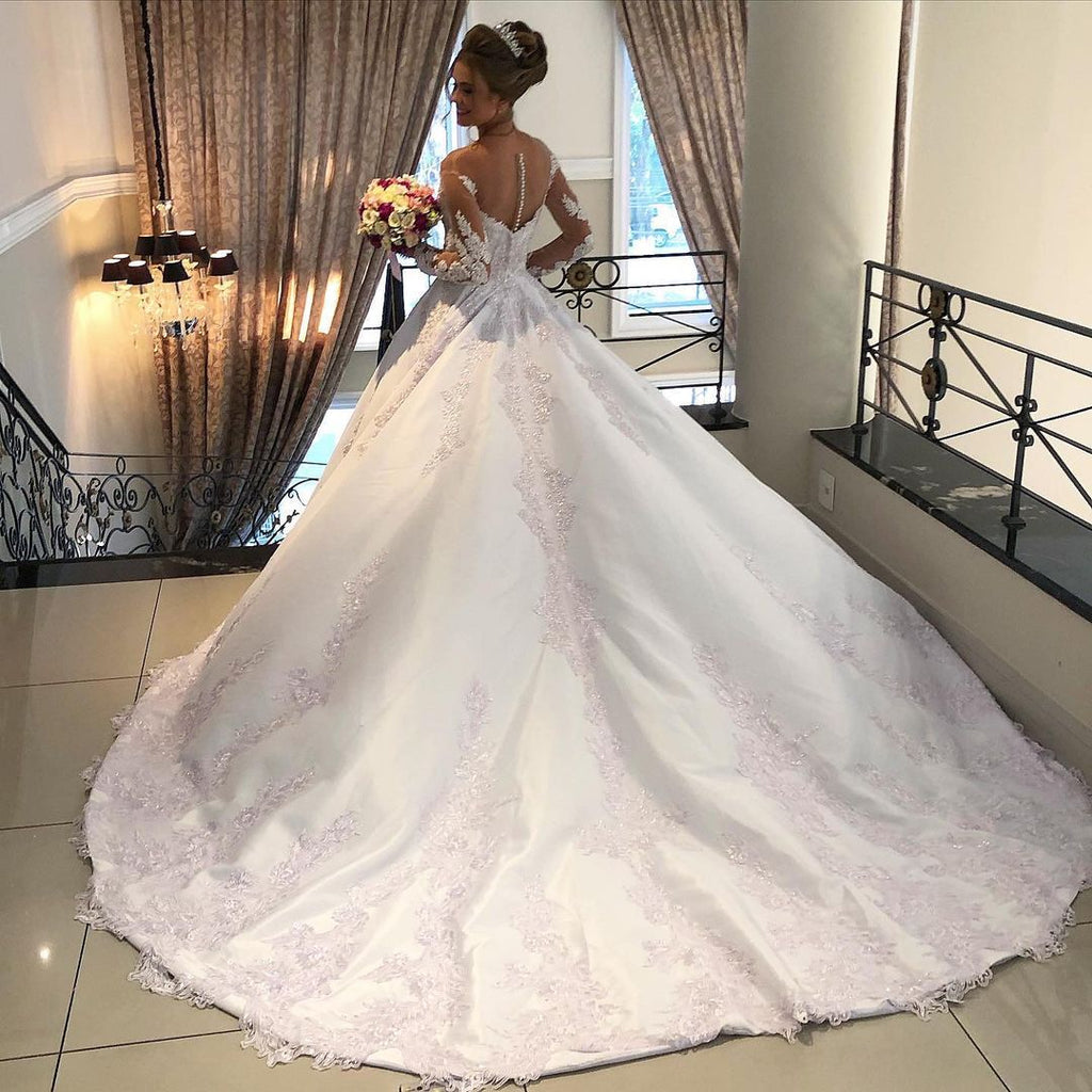 Precioso vestido de novia largo de tul con encaje satinado y escote en forma de A con mangas