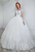 Hermoso vestido de novia largo de tul con encaje y mangas