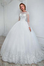 Hermoso vestido de novia largo de tul con encaje y mangas