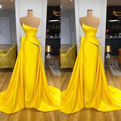 Hermoso vestido de fiesta largo amarillo de corte A con lentejuelas y sin mangas