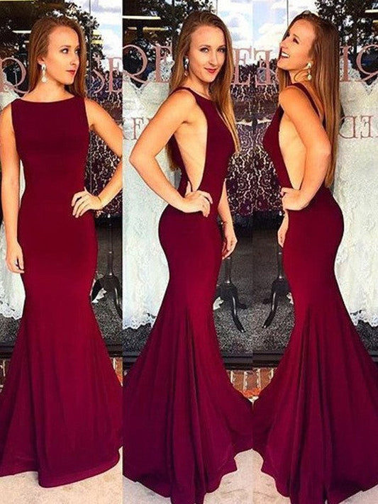 Hermosos vestidos de fiesta de spandex con escote barco y sirena sin mangas
