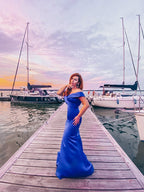 Hermosos vestidos de fiesta de sirena sin mangas con hombros descubiertos y volantes de satén