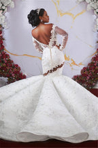 Hermoso vestido de novia de sirena con hombros descubiertos, mangas largas, sin volantes, apliques y cuentas