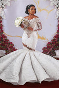 Hermoso vestido de novia de sirena con hombros descubiertos, mangas largas, sin volantes, apliques y cuentas