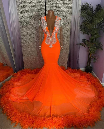 Precioso vestido de fiesta de sirena naranja con borlas, escote en V, encaje y mangas largas