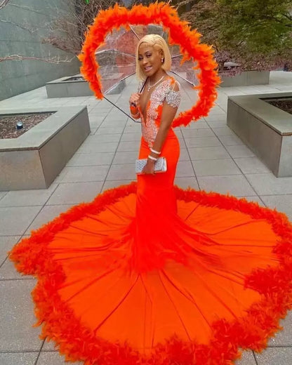 Precioso vestido de fiesta de sirena naranja con borlas, escote en V, encaje y mangas largas