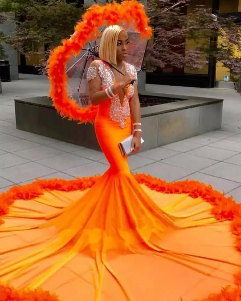 Precioso vestido de fiesta de sirena naranja con borlas, escote en V, encaje y mangas largas
