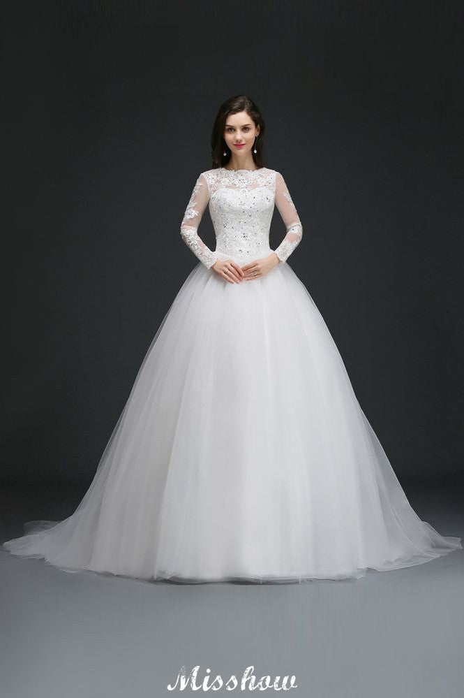 Hermosos vestidos de novia de tul con cola de corte