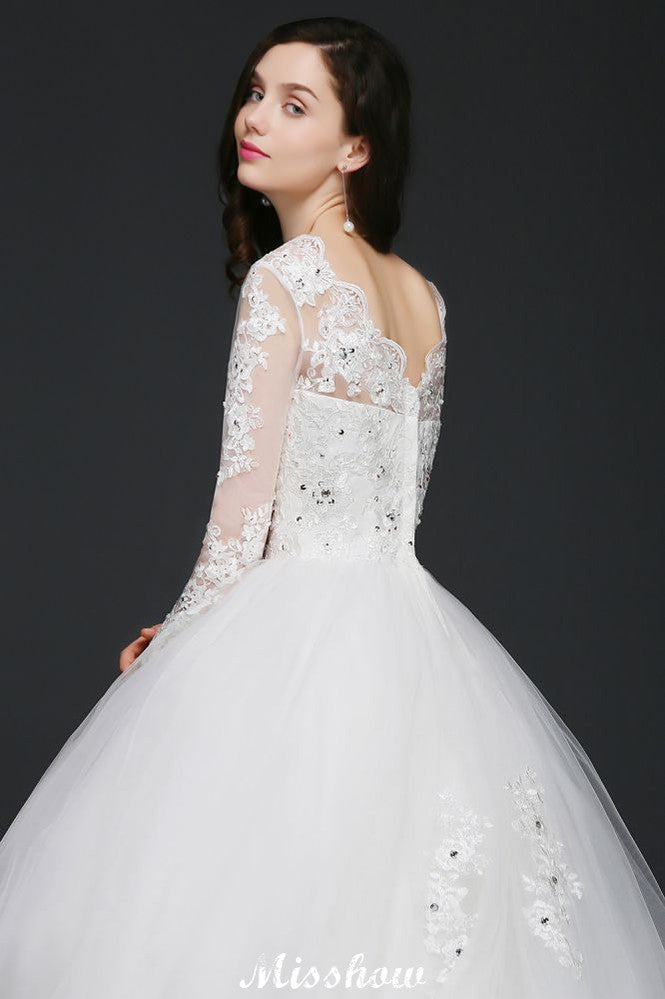 Hermosos vestidos de novia de tul con cola de corte