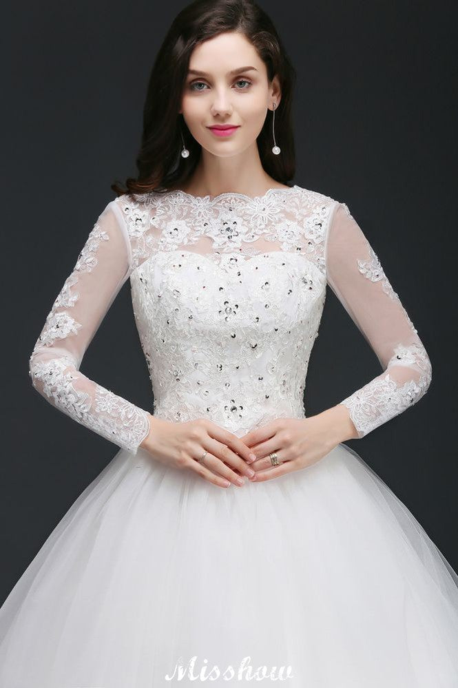 Hermosos vestidos de novia de tul con cola de corte