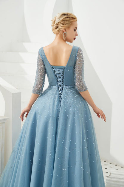 Vestido de noche largo de tul con media manga y escote en V y cuentas