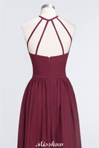 Vestido de dama de honor largo hasta el suelo, sin mangas y con cuello halter y volantes