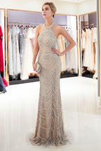Vestido de noche largo estilo sirena con lentejuelas y cuello halter sin mangas