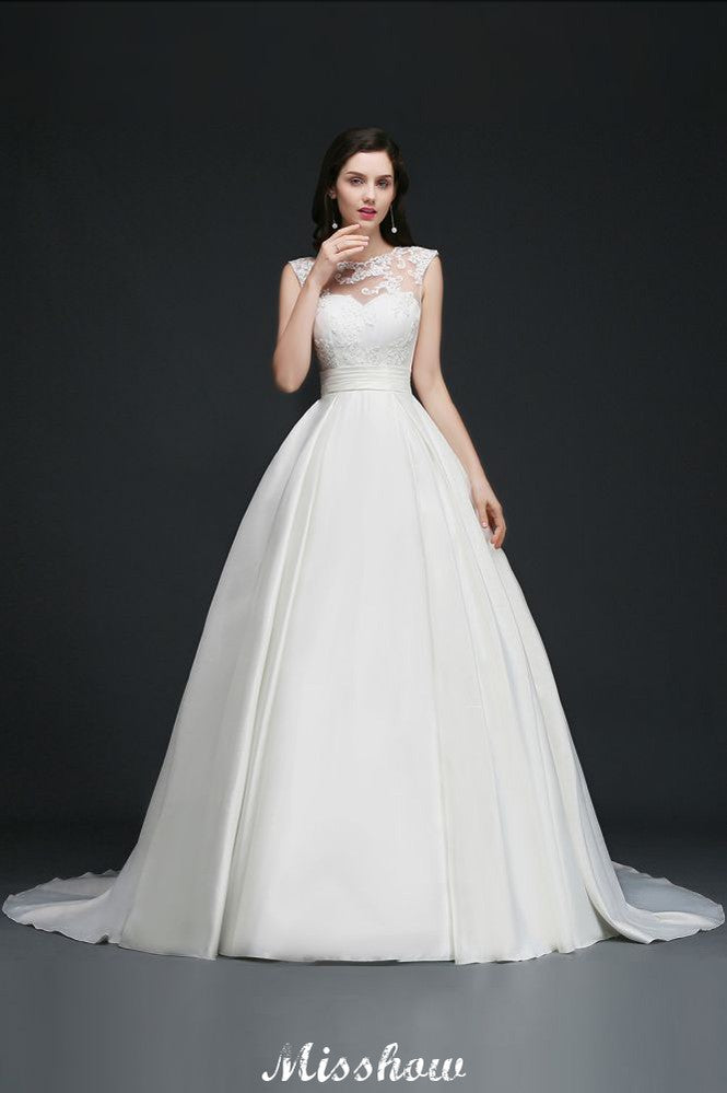 Vestido de novia delicado con encaje, corte A y joya
