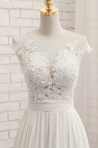 Vestido de novia largo de gasa con encaje y apliques en forma de A con abertura
