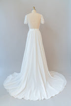 Vestido de novia largo de gasa con corte en A, espalda descubierta y mangas