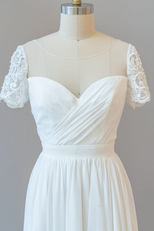 Vestido de novia largo de gasa con corte en A, espalda descubierta y mangas