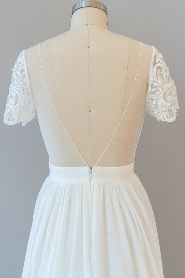Vestido de novia largo de gasa con corte en A, espalda descubierta y mangas