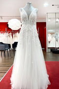 Langes, ärmelloses A-Linien-Brautkleid mit Tüll und Spitzenapplikationen und offenem Rücken