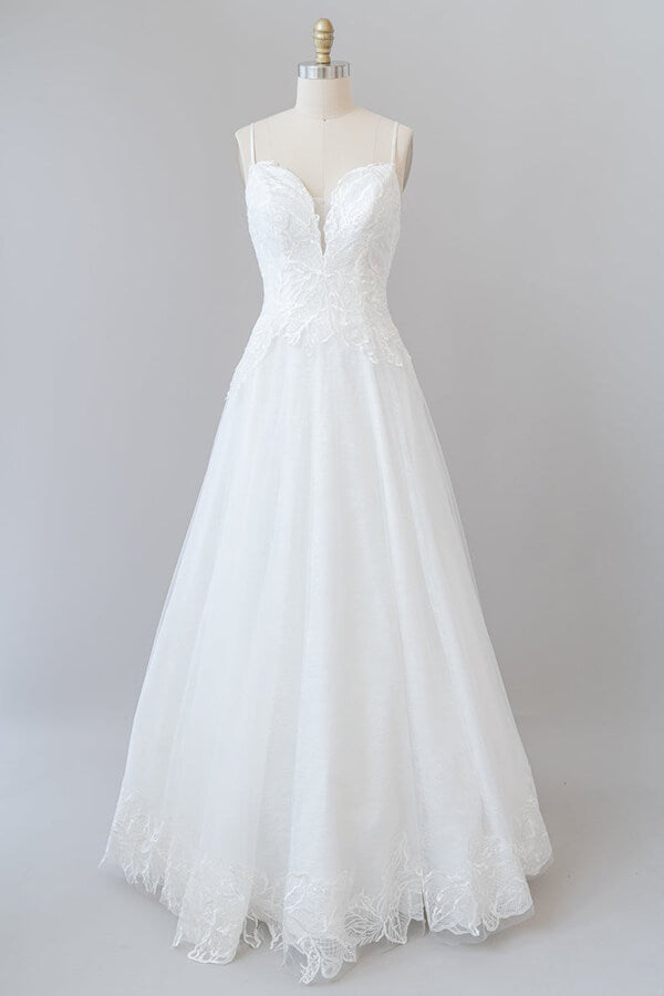 Vestido de novia largo de tul con espalda descubierta y tirantes finos en forma de A