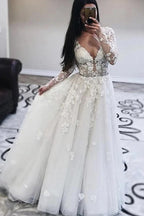 Vestido de novia largo de tul con encaje, apliques y escote en V, corte A y mangas