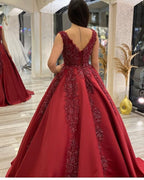Vestido de fiesta largo de satén con escote en V, espalda descubierta, apliques y volantes de cuentas