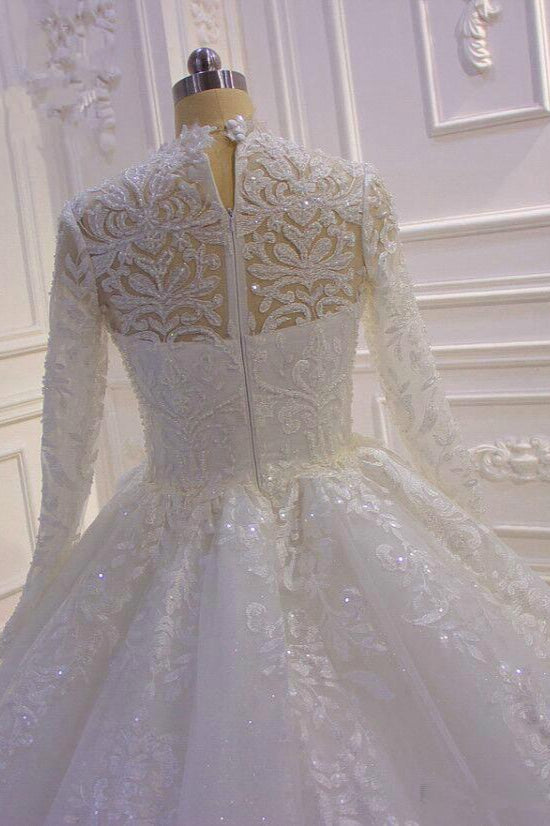 Vestido de novia largo de cuello alto con apliques de encaje y mangas