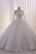 Vestido de novia largo de cuello alto con apliques de encaje y mangas