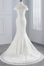Vestido de novia largo de sirena con encaje y hombros descubiertos