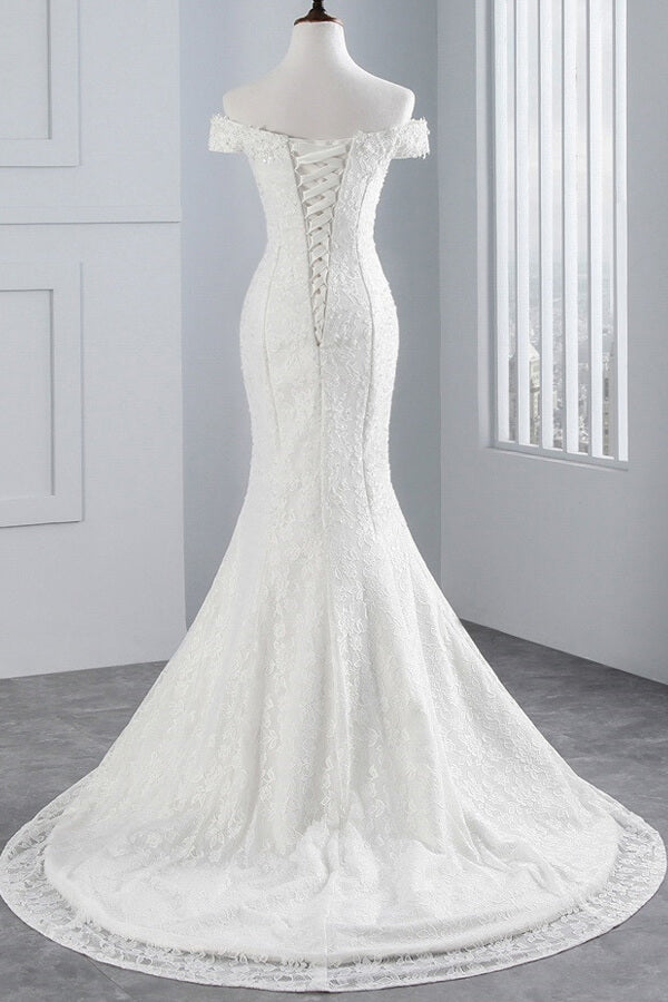 Vestido de novia largo de sirena con encaje y hombros descubiertos
