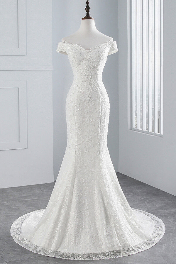 Vestido de novia largo de sirena con encaje y hombros descubiertos