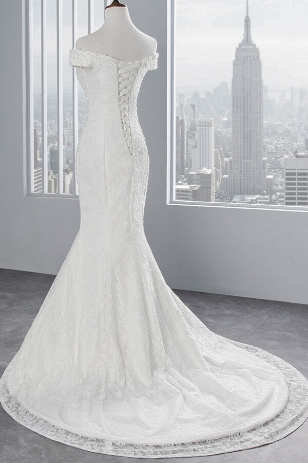 Vestido de novia largo de sirena con encaje y hombros descubiertos
