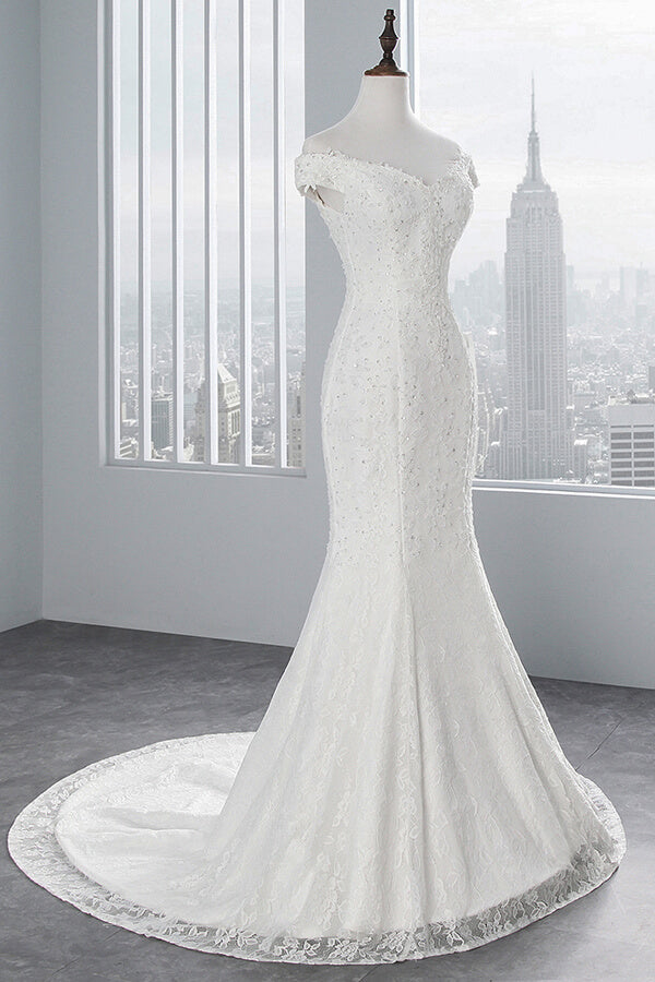 Vestido de novia largo de sirena con encaje y hombros descubiertos