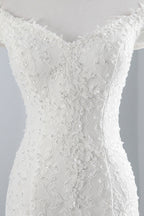Vestido de novia largo de sirena con encaje y hombros descubiertos