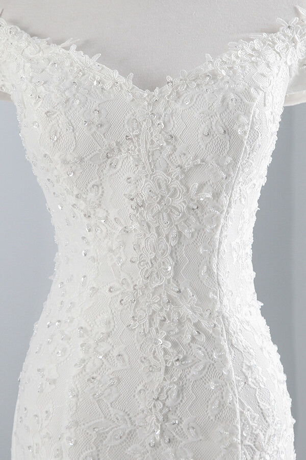 Vestido de novia largo de sirena con encaje y hombros descubiertos