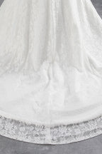 Vestido de novia largo de sirena con encaje y hombros descubiertos