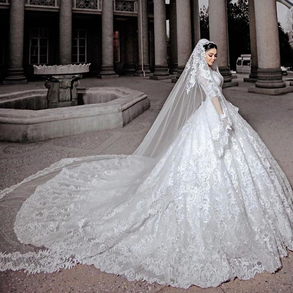 Vestido de novia largo de princesa con tul, cuentas, apliques de encaje y mangas