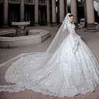 Vestido de novia largo de princesa con tul, cuentas, apliques de encaje y mangas