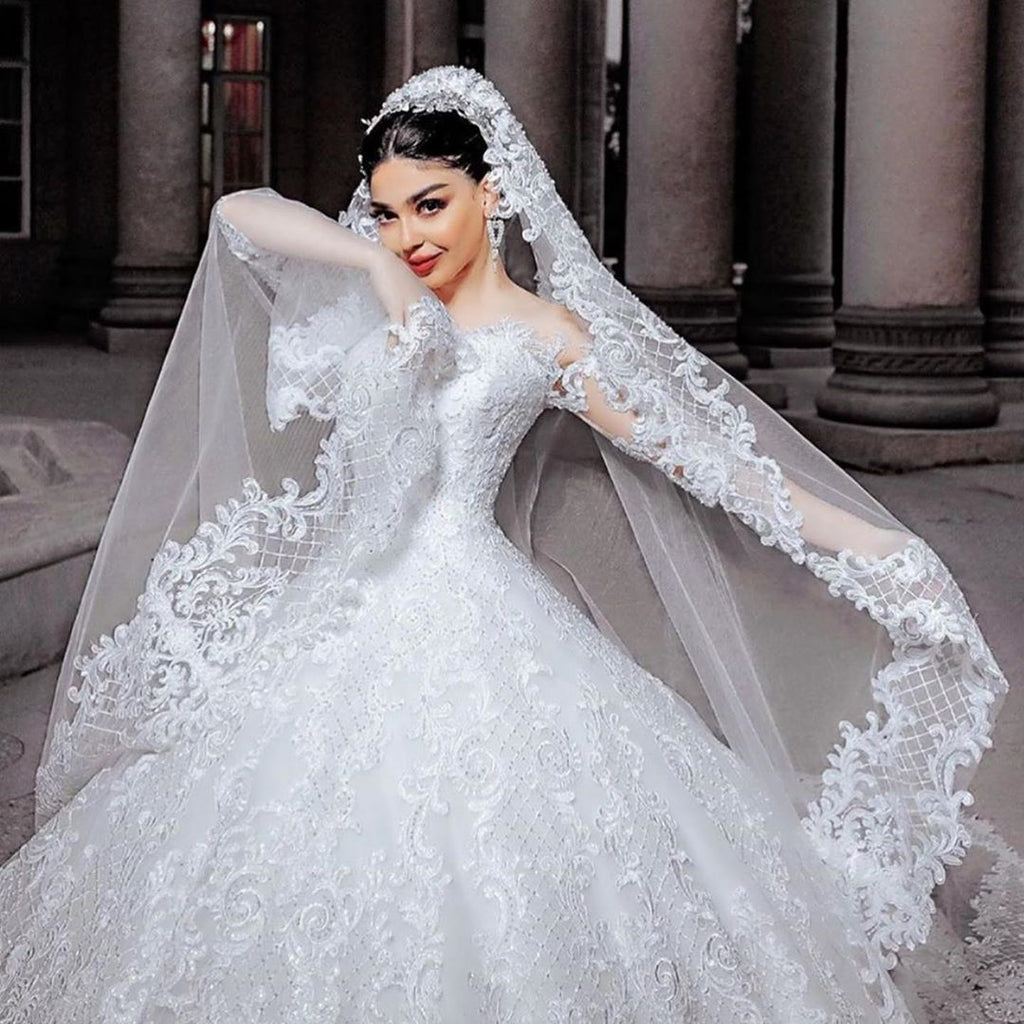 Vestido de novia largo de princesa con tul, cuentas, apliques de encaje y mangas