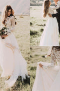 Vestido de novia de tul con apliques y mangas largas