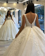 Vestido de novia largo con escote en forma de corazón, espalda descubierta, apliques de encaje y lentejuelas