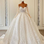 Lujosos vestidos de novia estilo princesa con encaje, manga larga y corte A